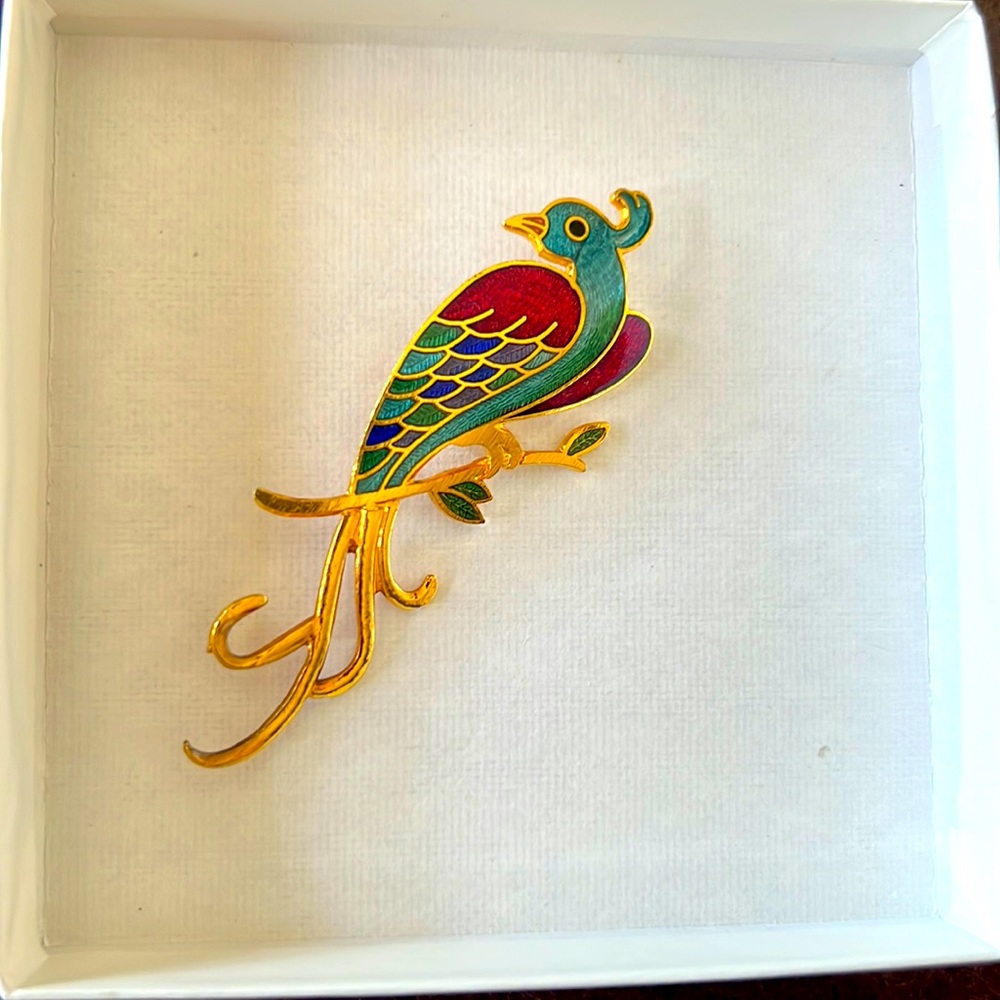 Peacock enameled pin symbol of beauty immortality and devine power